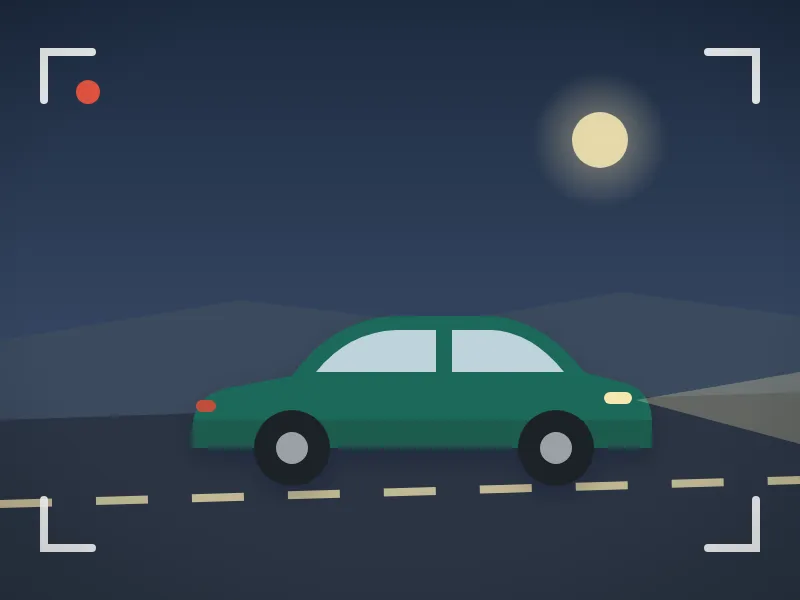 Illustration: a car driving on a road at night, framed by the corner marks of a camera view.